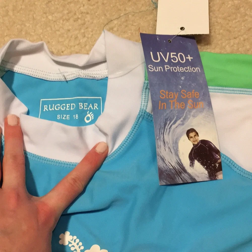 NWT UV protection swim shirts